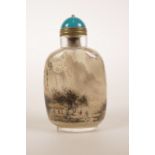 A Chinese reverse painted glass snuff bottle decorated with travelling figures in a landscape, 3½"