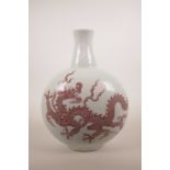 A Chinese red and white porcelain flask decorated with a dragon and flaming pearl, 6 character