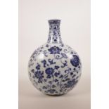 A Chinese blue and white porcelain moon flask with scrolling floral decoration, 6 character mark