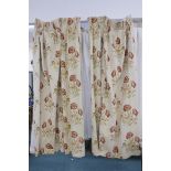 A pair of lined curtains with floral pattern, each 40" x 84", and a matching pair