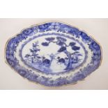 A late C19th Chinese exportware porcelain blue and white oval plate decorated with deer under a pine