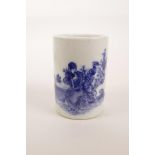 A Chinese blue and white brush pot decorated with a sage taking tea, 4 character mark to base, 4"