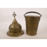 A brass Indo-Persian pot cover with chased script decoration, together with a similar bucket, 7½"