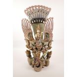 A Balinese carved and painted wood figure of Vishnu riding Garuda, losses, 20½" high