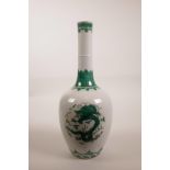 A Chinese famille verte enamelled porcelain vase with a long slender neck, decorated with a dragon