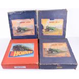 Four Hornby 0 gauge boxed clockwork trains sets