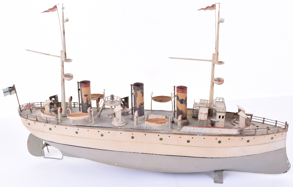 A Fine Carette clockwork tinplate three funnel Battleship, circa 1910,