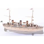 A Fine Carette clockwork tinplate three funnel Battleship, circa 1910,