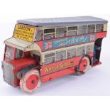 Wells tinplate c/w Double Decker World Service bus,