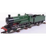 Gauge ll live steam model of a 4-4-0 locomotive and tender,