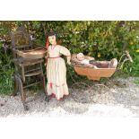 A Victorian dolls pram and child’s highchair,