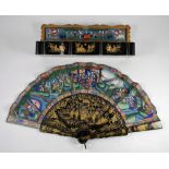A Chinese hand painted and lacquered fan,