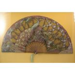 A good painted paper and lace fan decorated with a peacock,