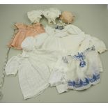 Collection of doll clothes,