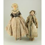 A pair of wax over composition shoulder head dolls, English circa 1860,