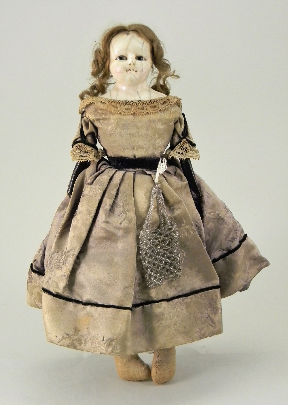 Wax over composition shoulder head doll, English circa 1860,