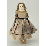 Wax over composition shoulder head doll, English circa 1860,