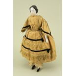 A good early glazed china shoulder head doll, German circa 1840,