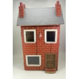 A nice painted red brick wooden dolls house, English circa 1890,