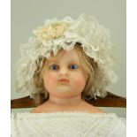 ‘Lilia’ a poured wax shoulder head doll by Montanari, English circa 1860,