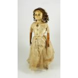 A wax over composition wire-eyed shoulder head doll, English circa 1860,
