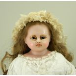 ‘Emma’ a poured wax shoulder head doll by Montanari, English circa 1860,