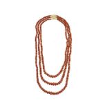 Necklace in yellow gold and salmon pink coral