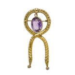 Brooch in yellow gold and amethyst