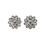 Pair of clip earrings in white gold and diamonds