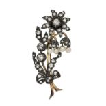 Floral brooch in gold, silver, diamonds and pearls