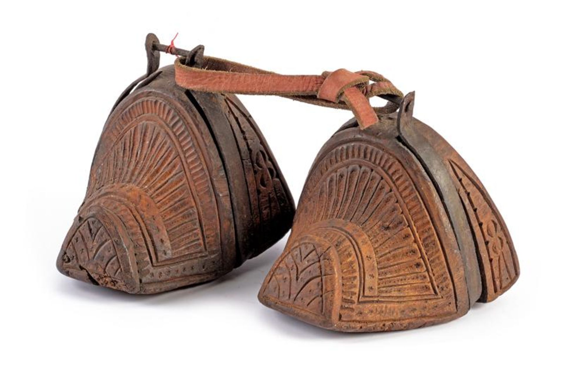 A pair of carved stirrups