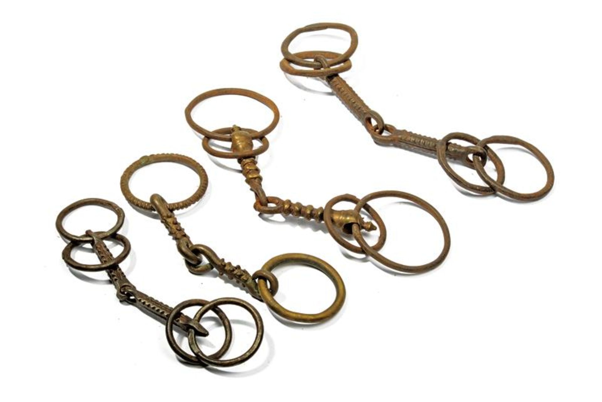 A lot of four snaffle bits