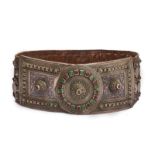 A beautiful silver mounted belt decorated with stones