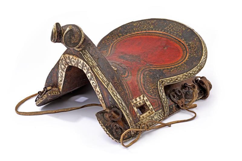 A beautiful painted and bone mounted saddle