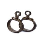 A rare pair of bronze stirrups