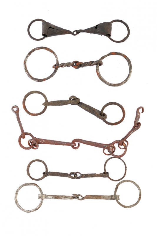 A lot of six horse and snaffle bits