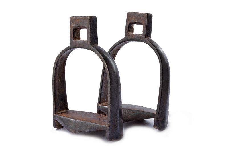 A rare and early pair of stirrups