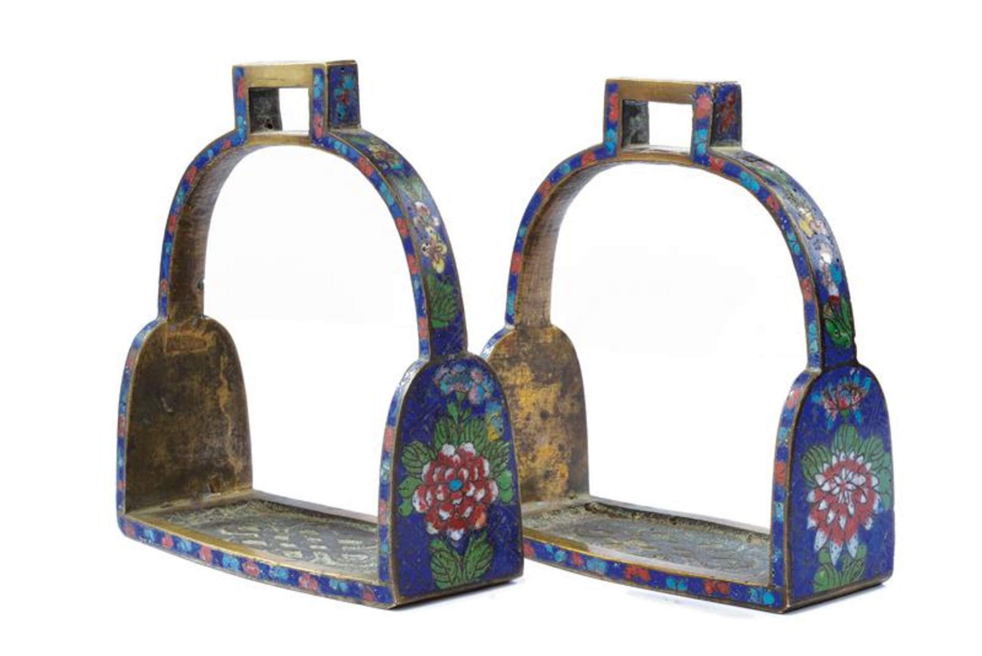 A pair of enameled stirrups