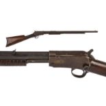 A Winchester Slide Action Rifle