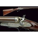 A beautiful twelve-bore double-barrelled breech loading gun