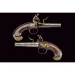 A fine pair of Queen Anne type flintlock pistols
