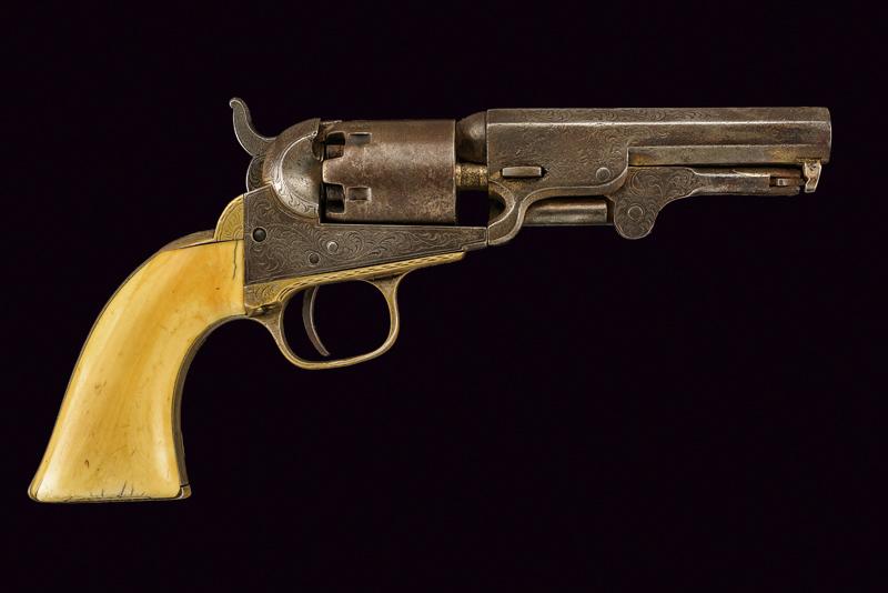 An engraved Colt Model 1849 Pocket Revolver