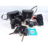 Pentacon Praktica SLR camera, pair of Chinon 8 x 30 binoculars,