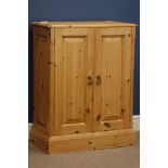 Pine two door cupboard with hinged top, W64cm, H82cm,