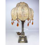 1930's cast metal corinthium column table lamp, inscribed,