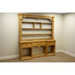 Waxed pine kitchen dresser, reverse break front, two drawers,