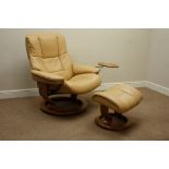 Ekornes Stressless adjustable armchair and matching stool upholstered in light tan leather,
