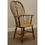 Early 19th century elm and ash Windsor armchair, double bow,