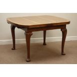 Walnut drawer leaf dining table, rectangular top with rounded ends, on cabriole legs,