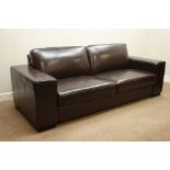 Large three seat sofa upholstered in brown leather,